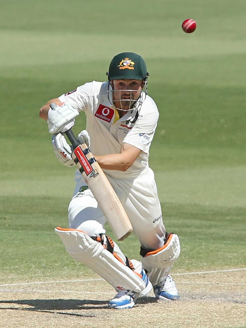 Down to business... Ed Cowan plays a shot on day three