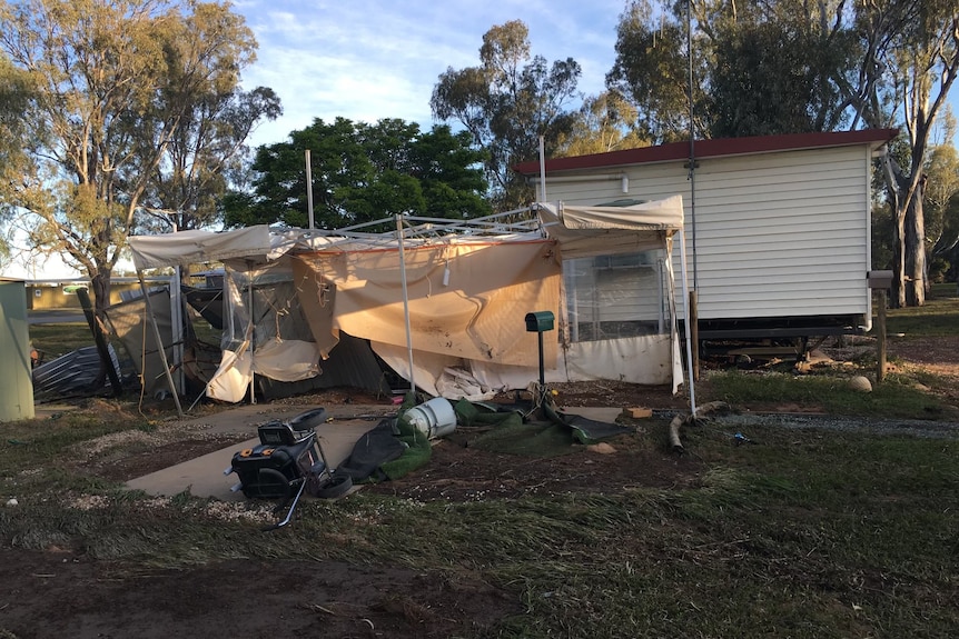 A collapsed cabin in a caravan park.