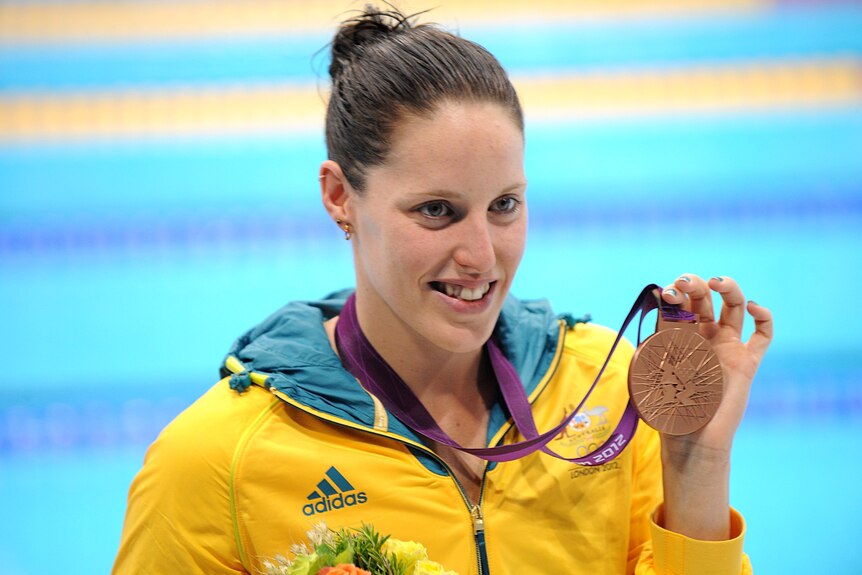 Alicia Coutts holds a bronze medal at the 2012 London Olympics.