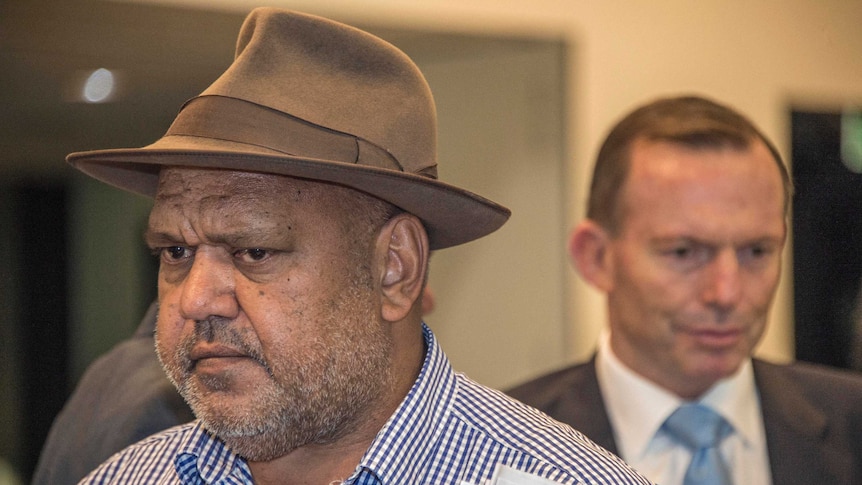 Noel Pearson in front of Tony Abbott