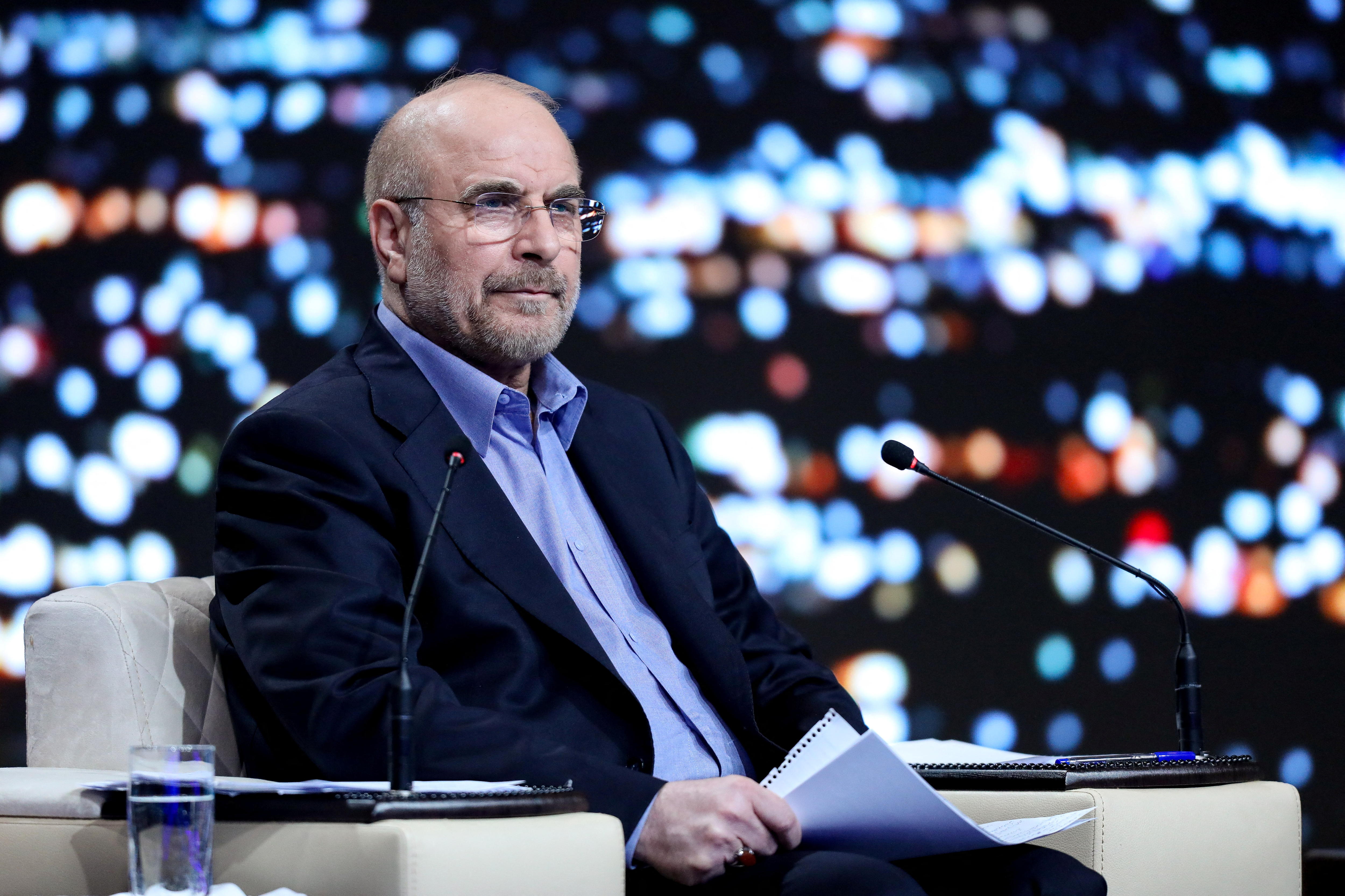 Mohammad Bagher Ghalibaf ​attends an election debate at a television studio.