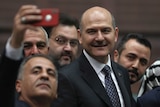 Turkey's former Interior Minister Suleyman Soylu poses for a selfie.