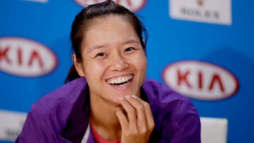 China's Li Na smiles during a press conference ahead of the Australian Open final.