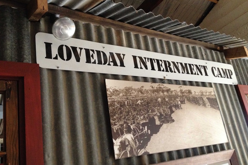 Corrugated iron hut with sign for the Loveday Internment Camp