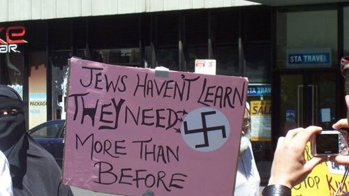 A child holds up a placard during the January 2009 Gaza war protest demonstration in Melbourne