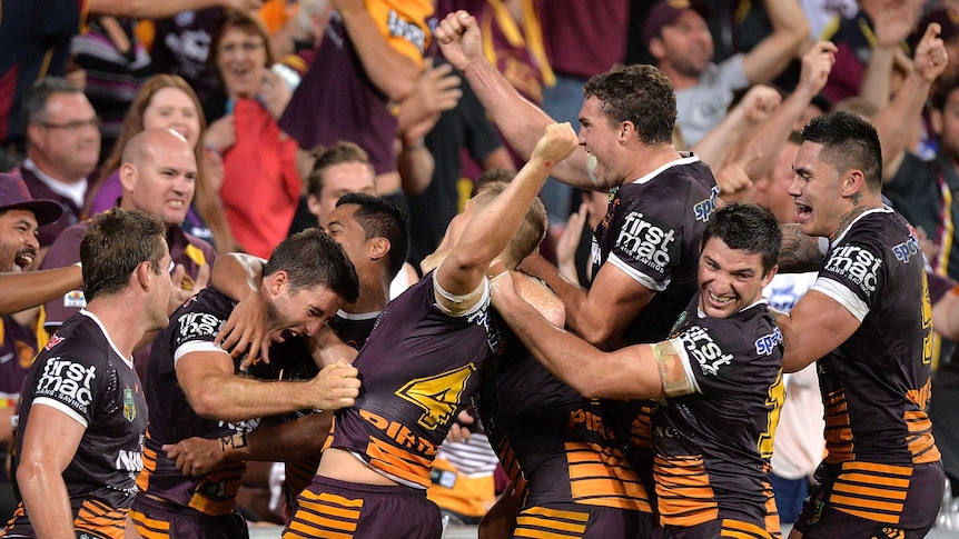 Ben Hunt celebrates scoring golden-point try against the Roosters