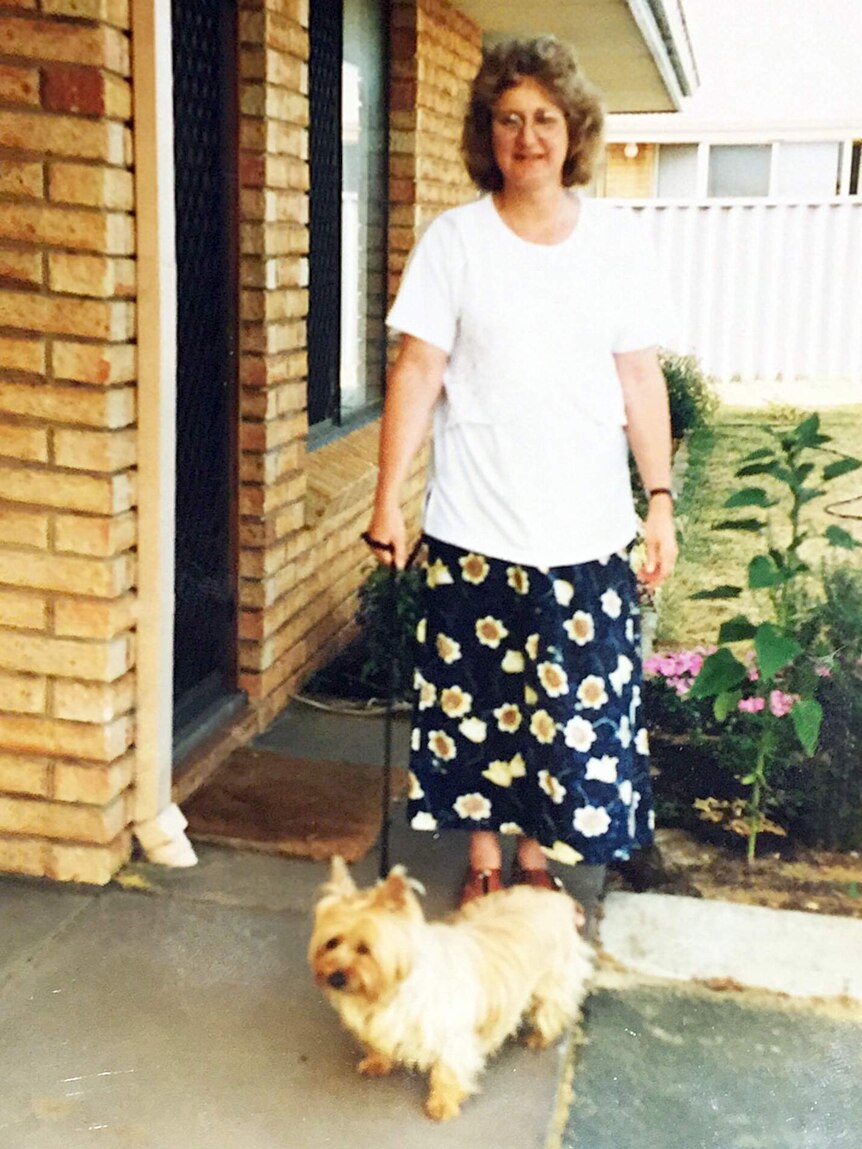 Wendy Morris standing outside the door of her home in the Bunbury housing cooperative where she lived.