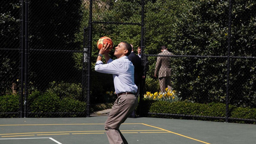 Barack Obama plays basketball during the annual 2010 Easter Egg Roll