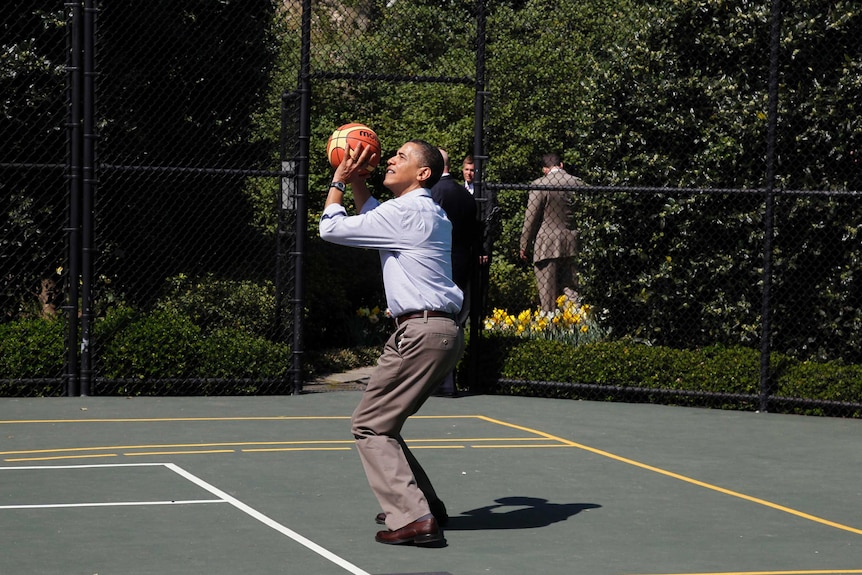 Barack Obama plays basketball during the annual 2010 Easter Egg Roll