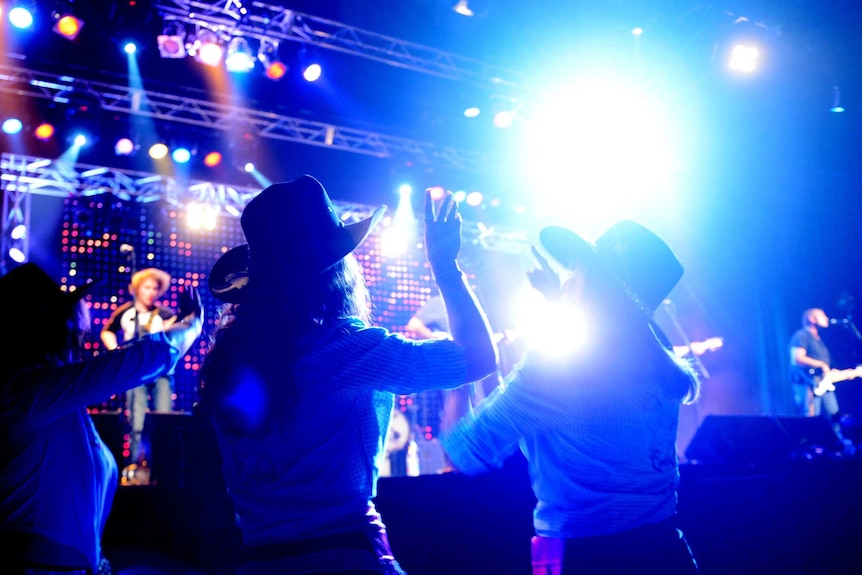 People dance to the Wolfe Brothers at the Tamworth Country Music Festival.