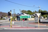 An intersection with traffic lights in suburban Perth. 