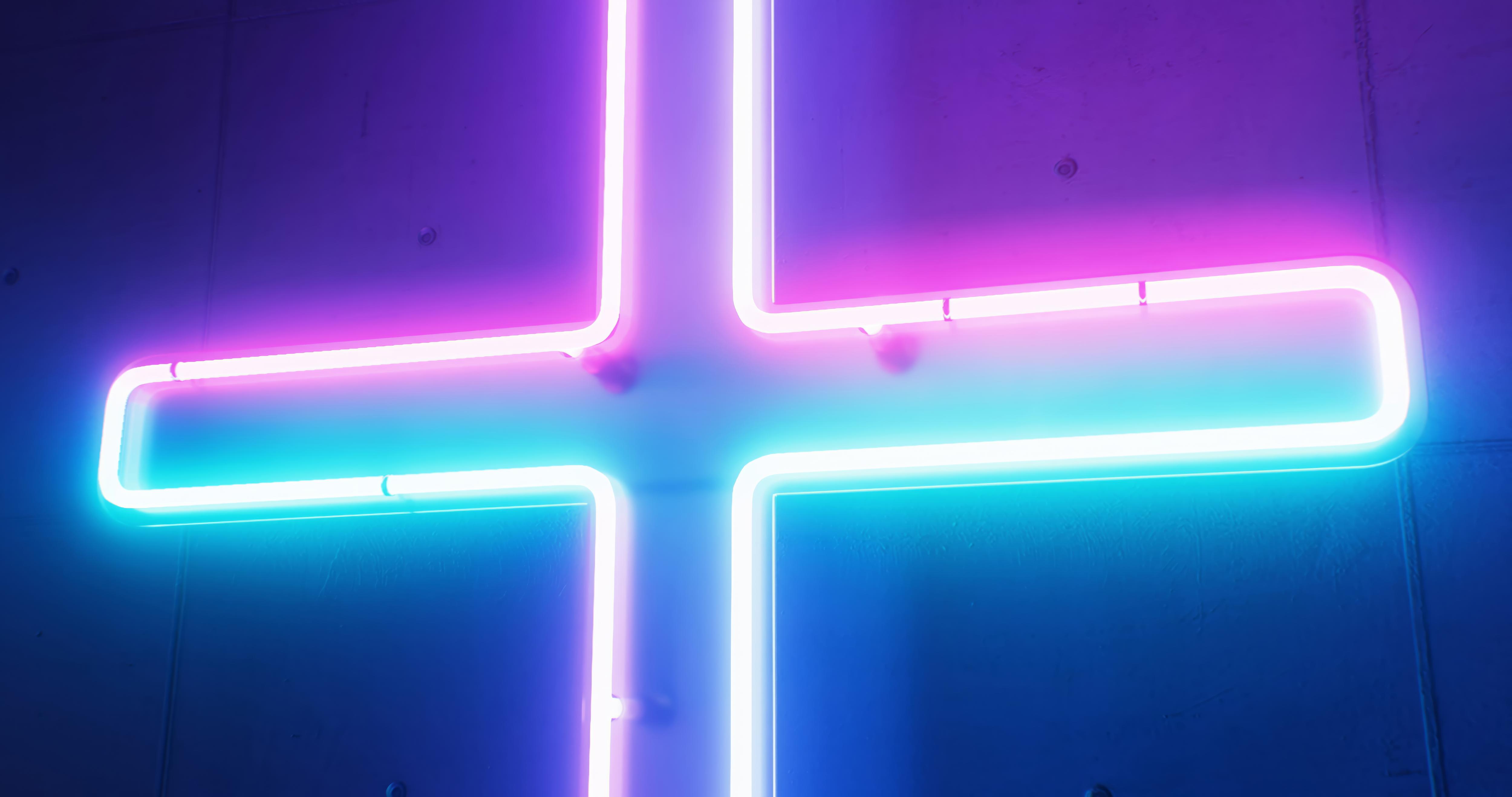 Neon cross in pink and blue