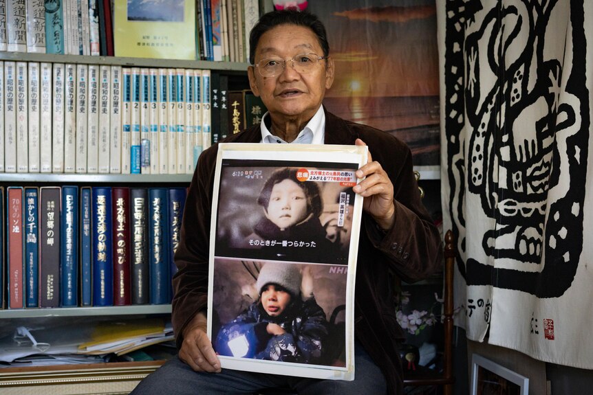 An older man holds up two images - one of himself as a child, and a picture of a crying Ukrainian boy