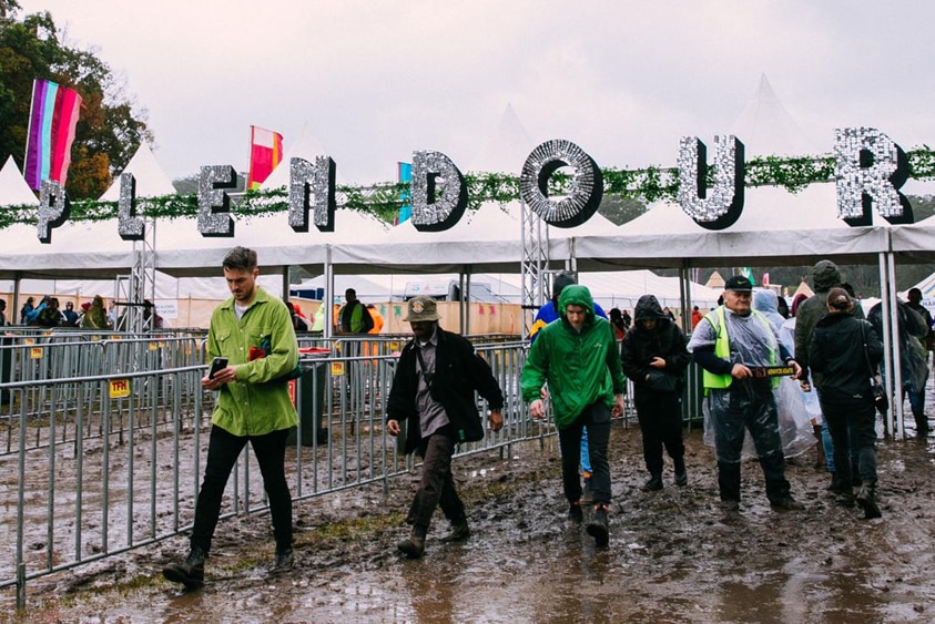 Muddy punters arriving at the gates at Splendour In The Grass