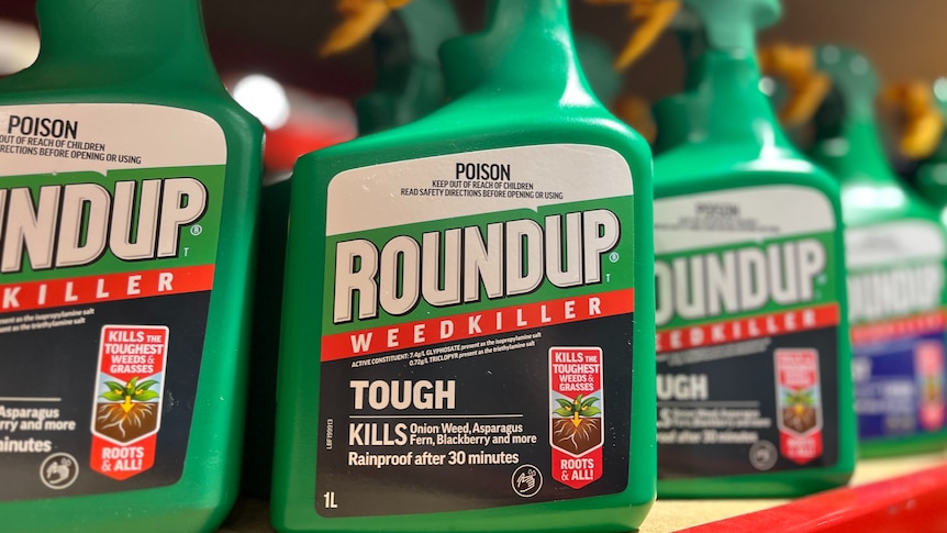 Spray bottle of Roundup on hardware store shelf