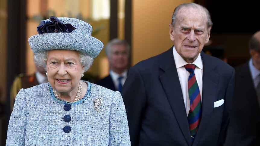 Queen Elizabeth II and Prince Philip, the Duke of Edinburgh leave the National Army Museum in London.