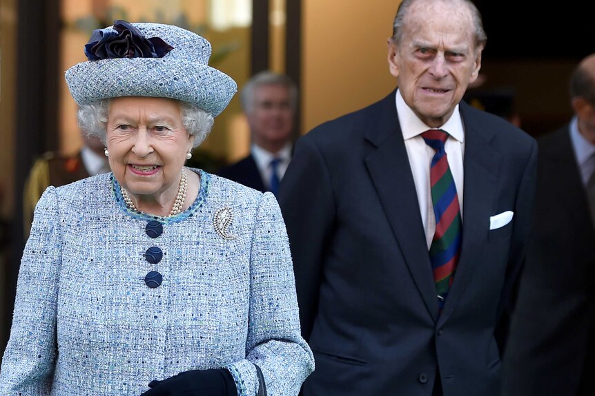 Queen Elizabeth II and Prince Philip, the Duke of Edinburgh leave the National Army Museum in London.