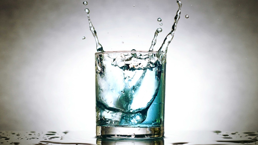 Splash of water in glass