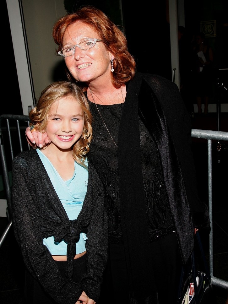 Courtney Kennedy Hill stands alongside her daughter Saoirse at an event