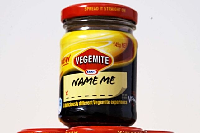 Four jars of new vegemite with name me written on them
