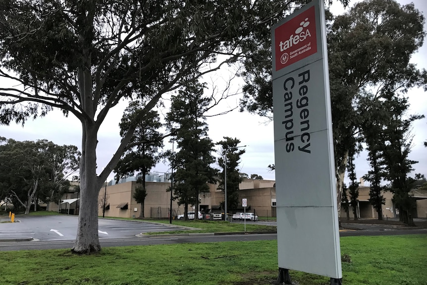 A TAFE SA sign out the front of a building that says Regency Campus