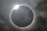 A solar eclipse at Palm Cove in north Queensland is shown following totality, November 14, 2012.