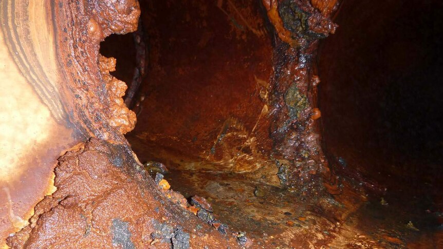 A badly corroded water pipe.