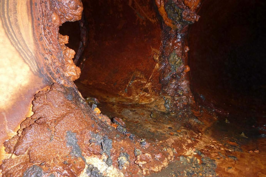 A badly corroded water pipe.