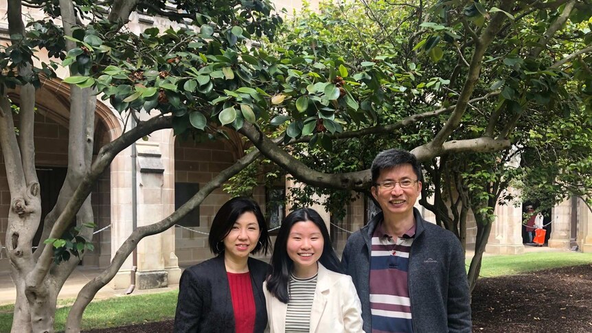 Chen Jie from Malaysia is with her parents