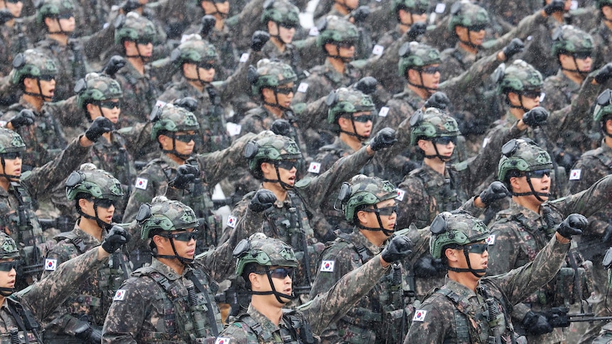 South Korean troops march during a celebration.