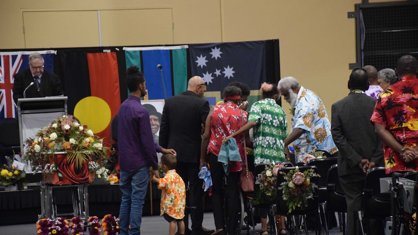 Mourners pay their respects at the funeral of Bonita Mabo.