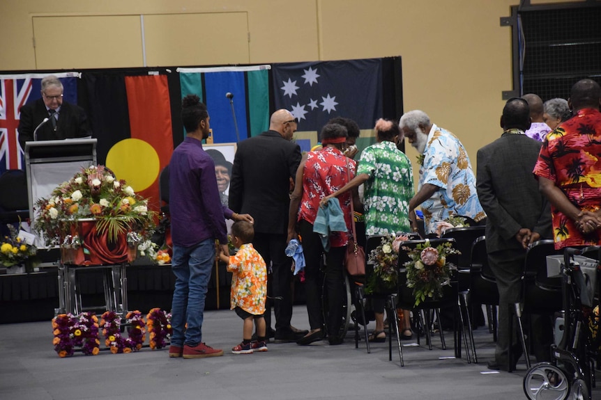 Mourners pay their respects at the funeral of Bonita Mabo.