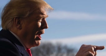 US president Donald Trump points while speaking to the media