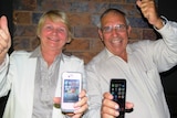 Barcoo Mayor Julie Groves and Diamantina Mayor Geoff Morton celebrate a win for outback telecommunications