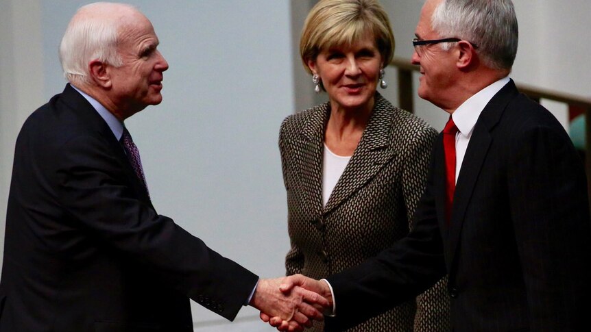 US senator John McCain shakes hands with PM Malcolm Turnbull