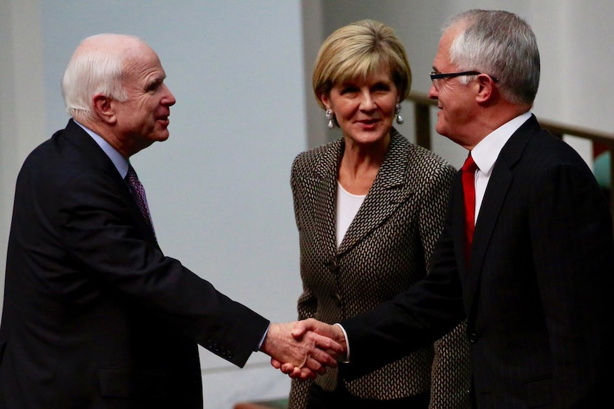 US senator John McCain shakes hands with PM Malcolm Turnbull