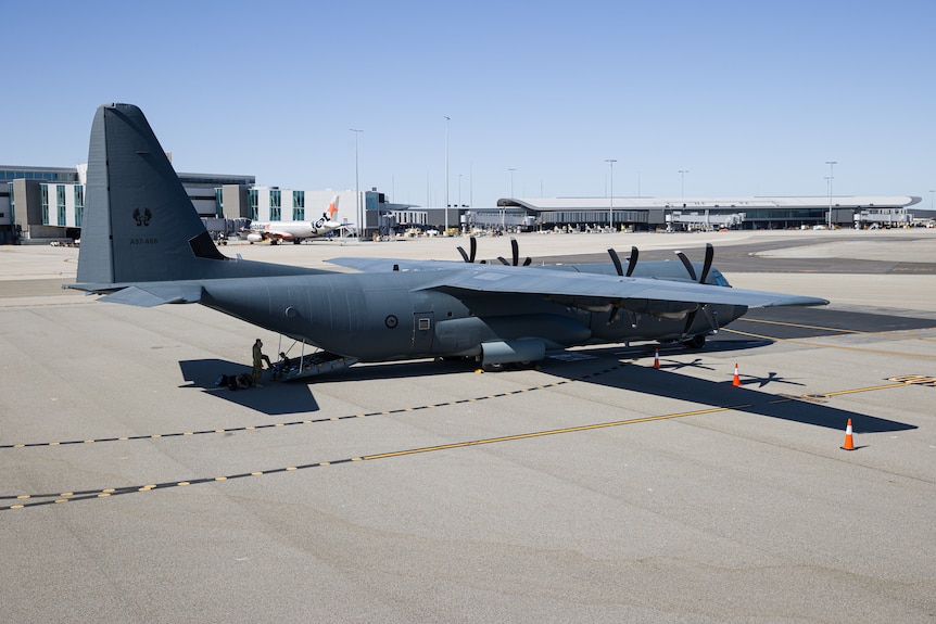 A huge military plane on the tarmac