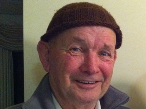 Ken Handford wears a beanie and smiles.