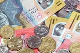 Australian coins and notes in a pile.