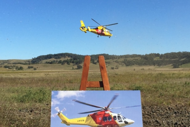 The rescue helicopter flies past the site of its new home