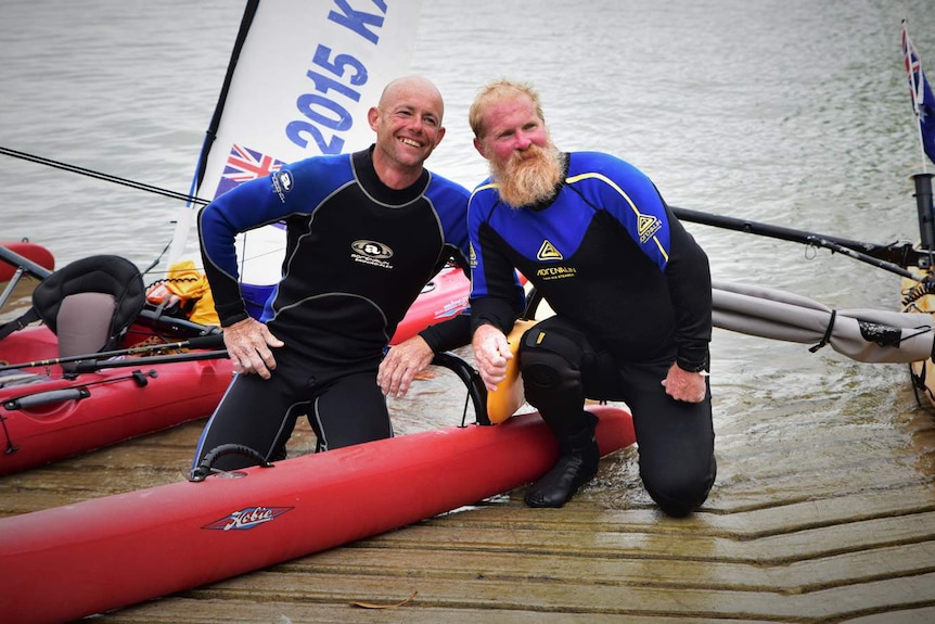 George Kirkland and Malcolm Skelton celebrate at the finish line of their 456 kilometre ocean voyage
