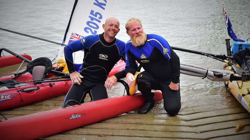 George Kirkland and Malcolm Skelton celebrate at the finish line of their 456 kilometre ocean voyage
