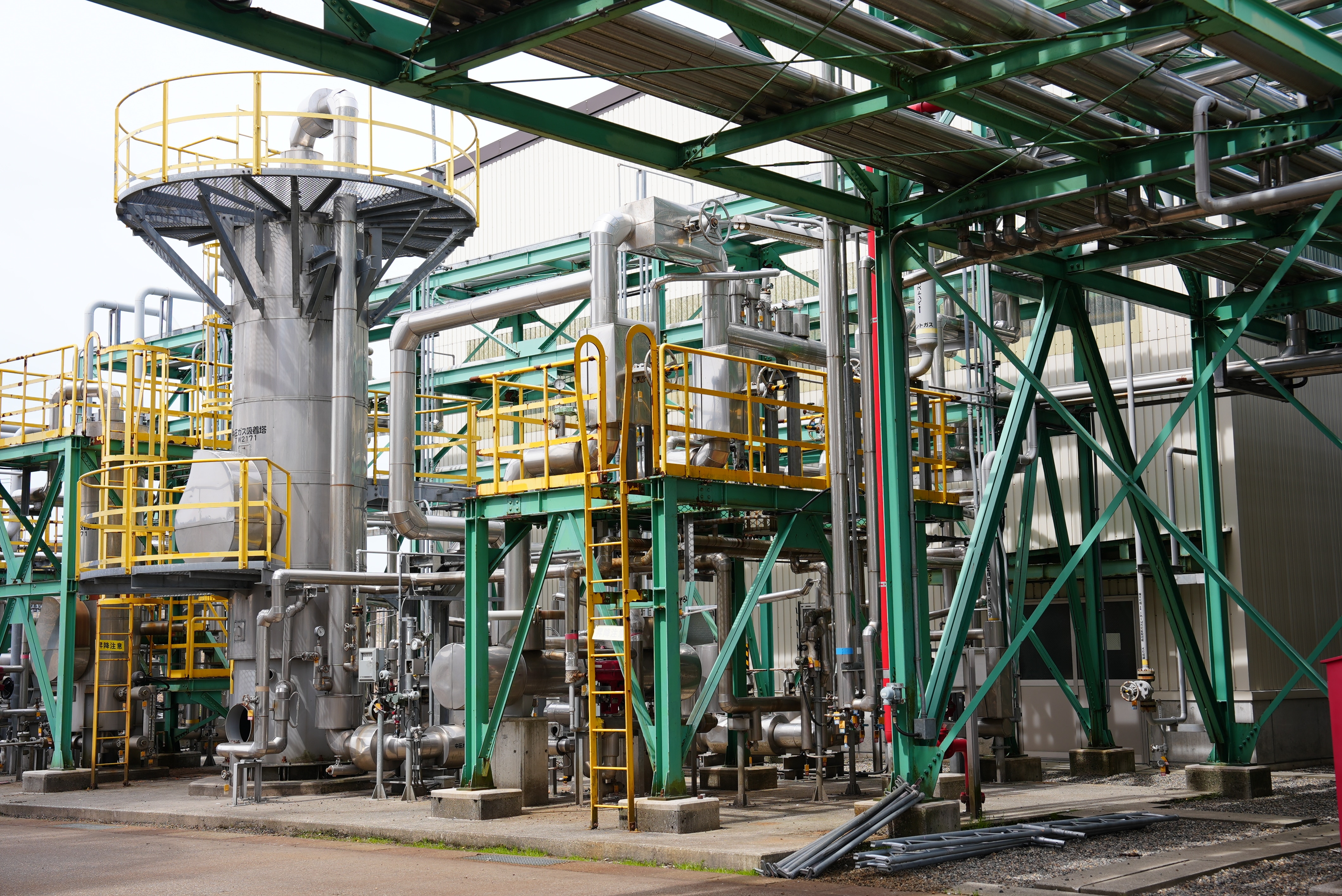 A close up of colourful pipes inside a factory.