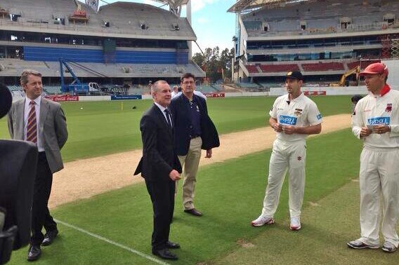 Jay Weatherill tosses the coin