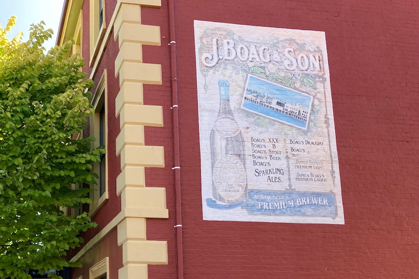 Vintage sign on the wall of the James Boag building in Launceston.