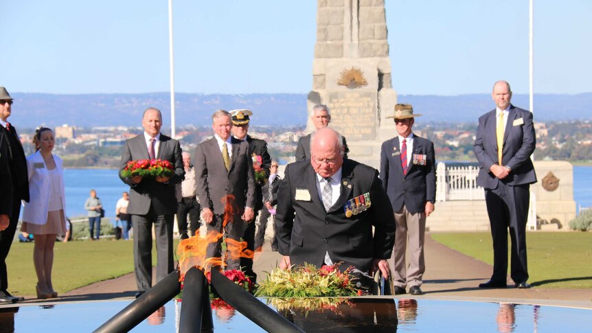 RSL president Graham Edwards places a wreath at Kings Park memorial