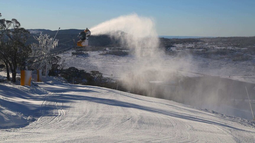 Snow machines on June 16 topping up the previous day's snowfall at Perisher Ski Resort.