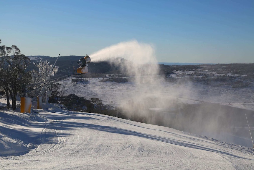 Snow machines on June 16 topping up the previous day's snowfall at Perisher Ski Resort.