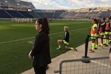 Megan Rapinoe kneels during US national anthem