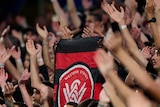 Western Sydney Wanderers flag in a crowd
